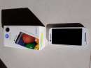 haz click para ver mas detalles de  Vendo celular moto e XT1025 TV blanco